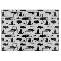 Schwarze Katzen auf Laptops