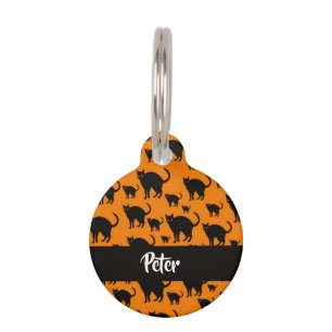 Schwarze Katzen auf orange Haustiermarke