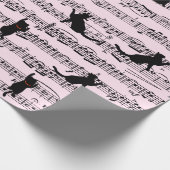 Schwarze Katzen auf rosa Noten Geschenkpapier (Ecke)