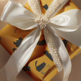 Schwarze Katzen auf Senfgelb mit blauen Umrandunge Geschenkpapier