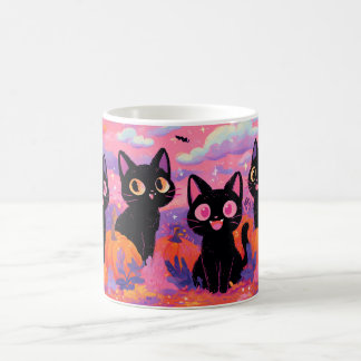 Schwarze Katzen in einer Pumpkinpflaster-Tasse Kaffeetasse