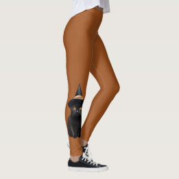 Schwarze Katzenhexe Halloween verbrannte orange Le Leggings
