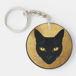 Schwarze Katzensilhouette vor einem goldenen Kreis Schlüsselanhänger