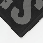 Schwarze, koksgraue und rote umfassende fleecedecke (Ecke)