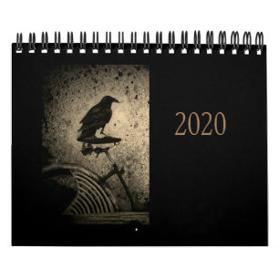 schwarze Krähe auf altem Fahrrad Kalender