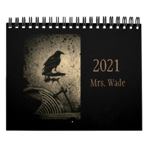 schwarze Krähe auf Vintage-Fahrrad-Kalender Kalender