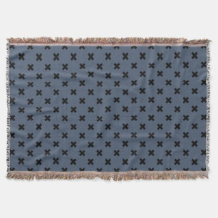 Schwarze Kreuzstiche auf blau-grau Decke