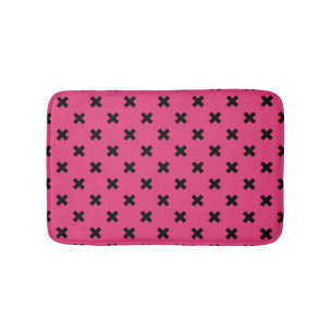 Schwarze Kreuzstiche auf Fuchsia Badematte