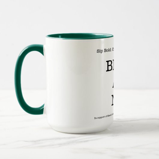 SCHWARZE KUNST JETZT Kaffeepause Tasse (Links)