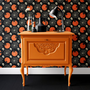 Schwarze Kürbisschädel und Spinnennetze Halloween Tapete
