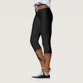 Schwarze Leggings mit Cowboy-Gurt lädt (Links)