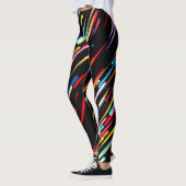 Schwarze Leggings mit farbenfrohen, fallenden Mete (Links)