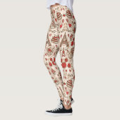 Schwarze Leggings mit farbenfrohen, fallenden Mete (Links)