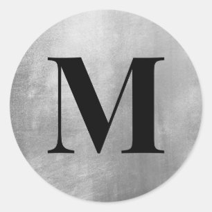 Schwarze Monogramm auf Imitaten Silberfolie Runder Aufkleber