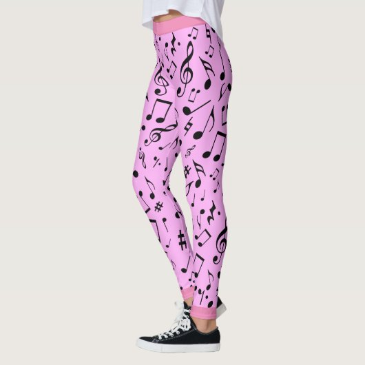 Schwarze Musiknoten auf Rosa (oder Ihre Münze) Leggings (Links)