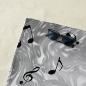 schwarze Musiknoten in silberfarbenem Strandtuch (Beispiel)