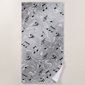 schwarze Musiknoten in silberfarbenem Strandtuch (Vorderseite)