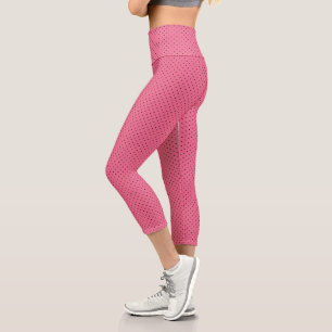Schwarze Nadelpunkte auf Rosa Capri Leggings