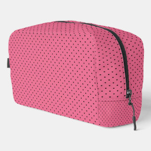 Schwarze Nadelpunkte auf Rosa Waschbeutel