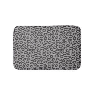 Schwarze Nettospitze mit Leopardmuster auf Weiß Badematte