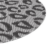 Schwarze Nettospitze mit Leopardmuster auf Weiß Schneidebrett (Ecke)