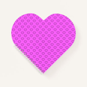 Schwarze Ohrhöre in rosa Herzform Notizblock