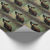 Schwarze orientalische Katze auf Vintagem blauem Geschenkpapier (Ecke)