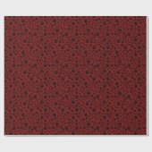 Schwarze Paw-Prints auf dunkelrot Geschenkpapier (Flach)
