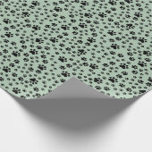 Schwarze Paw-Prints auf hellgrün Geschenkpapier (Ecke)