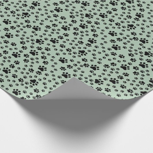 Schwarze Paw-Prints auf hellgrün Geschenkpapier (Ecke)