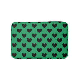 Schwarze Polka Herzen auf Kelly Green Badematte