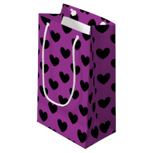Schwarze Polka-Herzen auf lila Kleine Geschenktüte