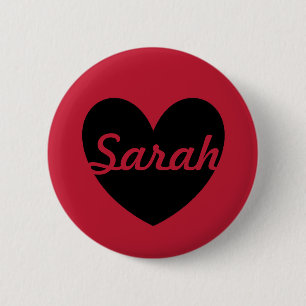 Schwarze Polka Herzen auf rot Button