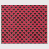 Schwarze Polka Herzen auf rot Geschenkpapier (Flach)