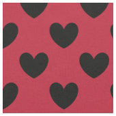 Schwarze Polka Herzen auf rot Stoff (Nahaufnahme)