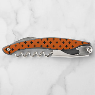 Schwarze Polka-Kreuze auf Orange Kellnermesser