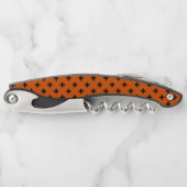 Schwarze Polka-Kreuze auf Orange Kellnermesser (Vorderseite)