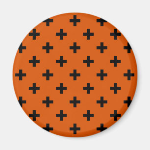 Schwarze Polka-Kreuze auf Orange Magnet