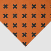 Schwarze Polka-Kreuze auf Orange Seidenpapier (Ausschnitt)