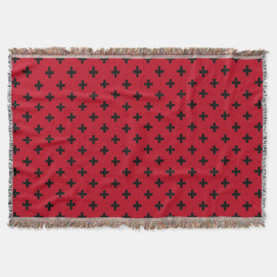 Schwarze Polka Kreuze auf rot Decke
