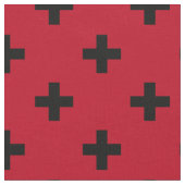 Schwarze Polka Kreuze auf rot Stoff (Nahaufnahme)