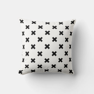 Schwarze Polka-Kreuze auf Weiß Kissen