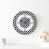 Schwarze Polka Punkte auf der Uhr der weißen Zahle (Zuhause)