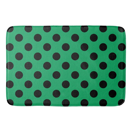 Schwarze Polka Punkte auf frisch grünem Badematte (Vorderseite)