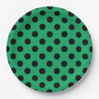 Schwarze Polka Punkte auf frisch grünem