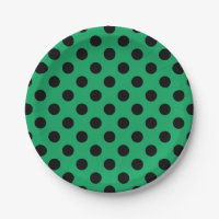 Schwarze Polka Punkte auf frisch grünem