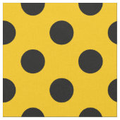 Schwarze Polka-Punkte auf Gelb Stoff (Nahaufnahme)
