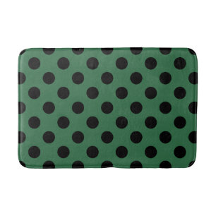 Schwarze Polka-Punkte auf kelgrün Badematte