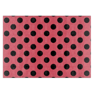 Schwarze Polka Punkte auf Korallen Schneidebrett
