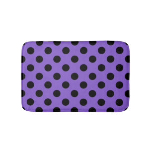 Schwarze Polka-Punkte auf Lavendel Badematte